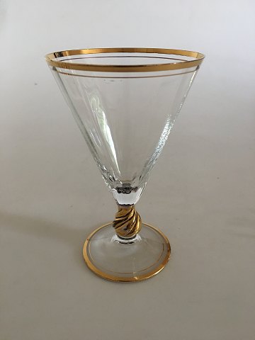 Holmegaard Ida rødvinsglas med guld på stilk, rand og fod. 
